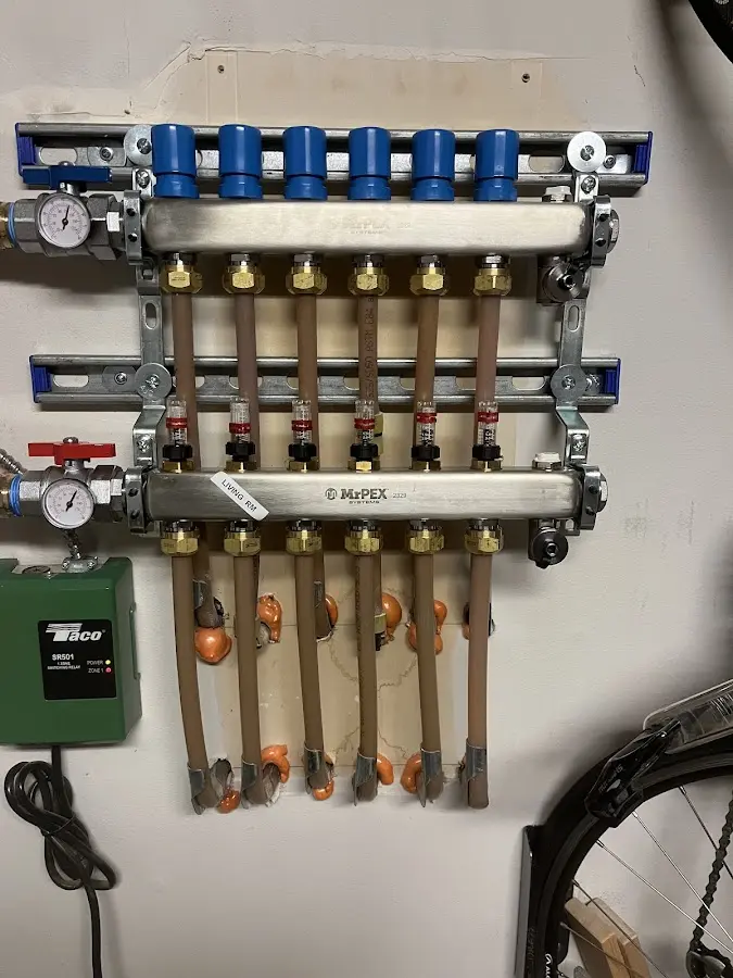 Plumber performing Water Heater Repair at a residential property in Galena